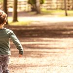 boy walking away